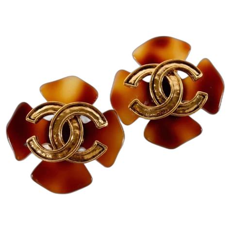 CHANEL Faux Tortoise Clover Cross CC Clip On Earrings